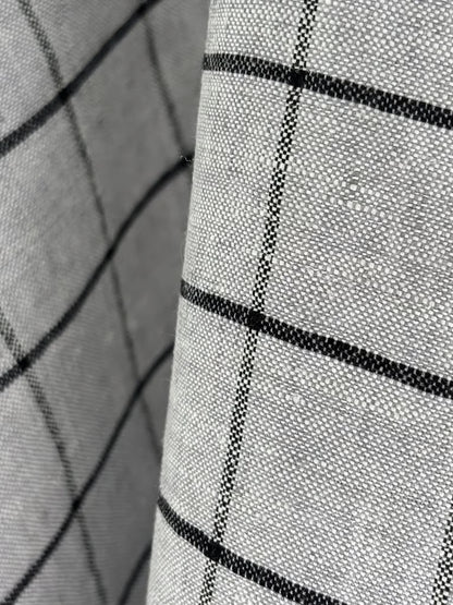 Grått, rutete kjøkkenhåndkle